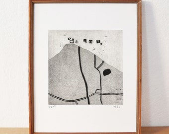 May include: Black and white print of a landscape with a mountain, houses, and a road. The print is framed in a wooden frame and is signed "PK47" and "4/60".