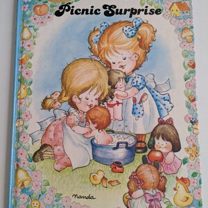 The Little Girls' Picnic Surprise, illustrated by J. L. Macias S. retold by J. Carruth