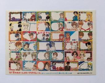 May include: A sheet of colorful stickers featuring anime-style illustrations of people and decorative frames. The stickers have text in Japanese, including the year 1997 and the words "Happy" and "Date".