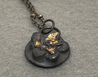 Succulent with 22 karat gold