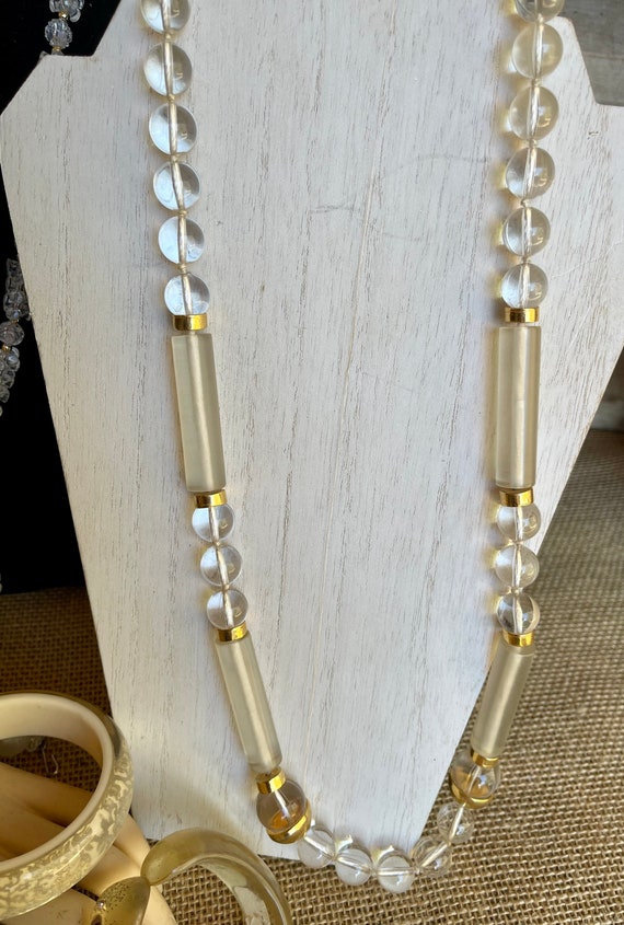 Very early plastics clear jewelry set with several br… Gem