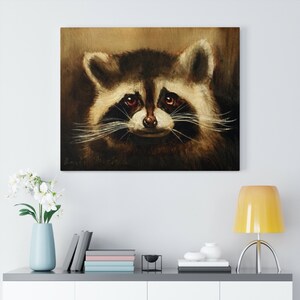May include: A close-up painting of a raccoon's face. The raccoon has dark brown fur, a black nose, and black eyes. The background is a muted brown color.
