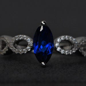 sapphire rings silver marquise cut blue sapphire engagement ring women September birthstone ring infinity rings