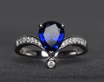婚約指輪、ブルーサファイアリング、9月の誕生石、ペアカットの宝石