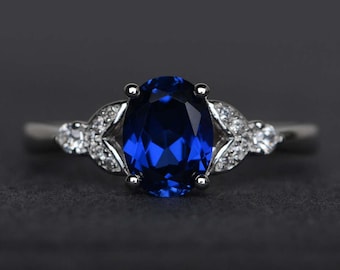 oval cut blue sapphire proposal ring blue gemstone sterling silver September birthstone