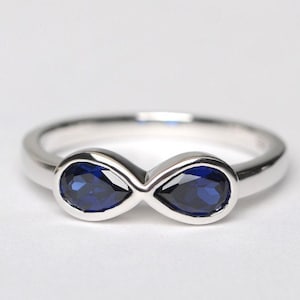 simple infinity ringblue sapphire ring silver wedding ring September birthstone ring elegant wedding ring