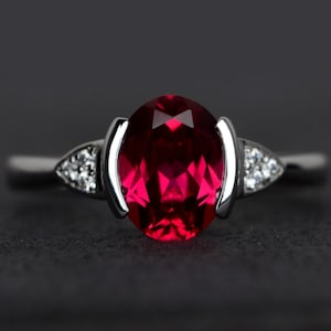 red ruby ring oval cut silver ring red gemstone July birthstone ring