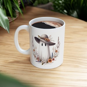 Cute cottagecore ghost wildflowers coffee mug, festive halloween ceramic mug gift, fall aesthetic halloween mug, fall decor ghost cup