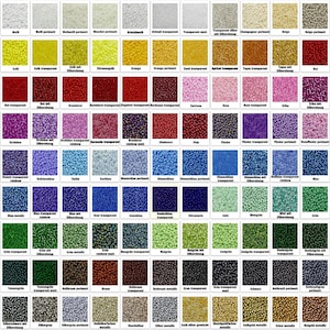 May include: A chart of 100 different colors of seed beads. The beads are arranged in a grid pattern, with each color having its own square. The colors range from white to black, and include many shades of red, blue, green, yellow, and purple. The chart is labeled with the German names for each color.
