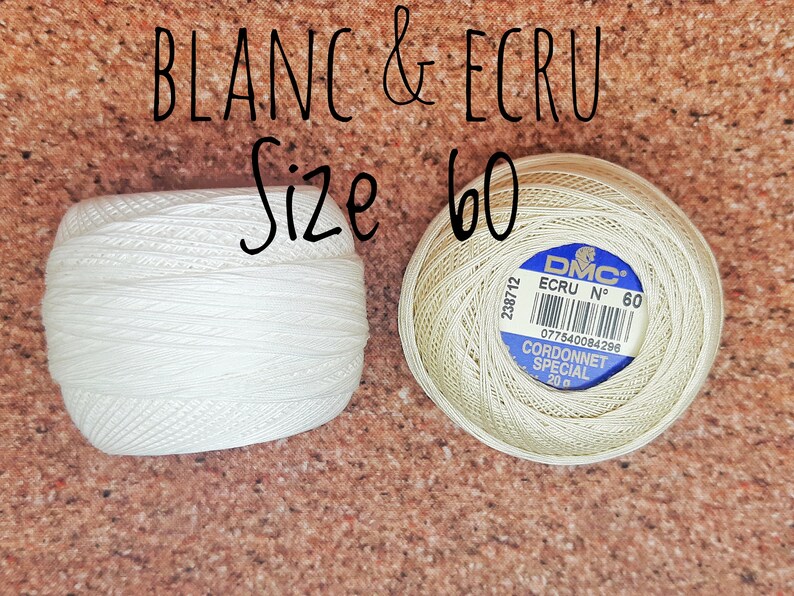 May include: Two spools of DMC Cordonnet Special embroidery floss, one white and one ecru, both size 60. The ecru spool has the DMC label with the text "ECRU N&deg; 60" and "CORDONNET SPECIAL 20 g".