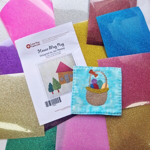 May include: A craft kit for making a house-shaped mug rug. The kit includes everything needed to complete the project, including fabric, thread, and needles. The kit is designed by Jon Massey and is available in a variety of colours.