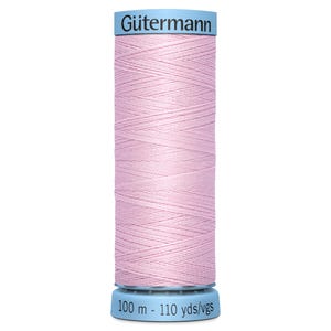 May include: A spool of pink Gütermann sewing thread with a blue label. The label reads "Gütermann" and "100 m - 110 yds/vgs".