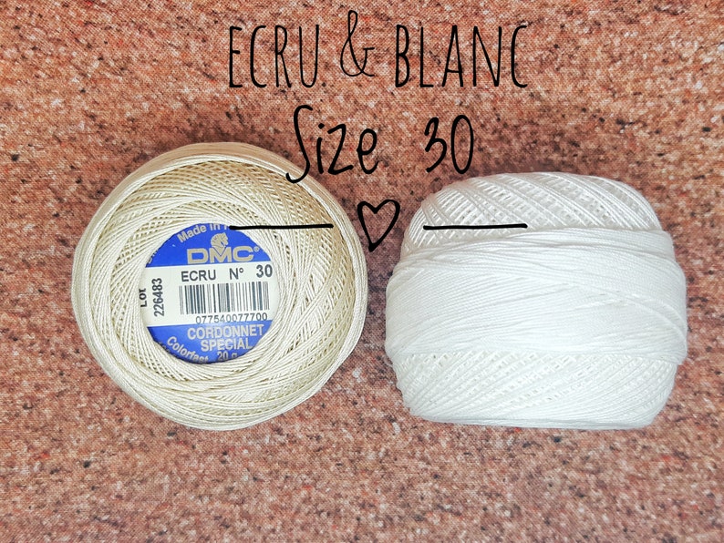 May include: Two spools of DMC Cordonnet Special embroidery floss, one in ecru and one in white. Both spools are size 30.