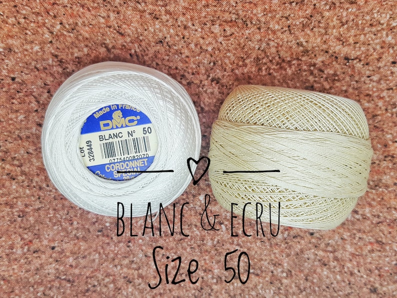 May include: Two spools of DMC embroidery floss, one white and one ecru, both labeled "BLANC N&deg; 50" and "CORDONNET SPECIAL".