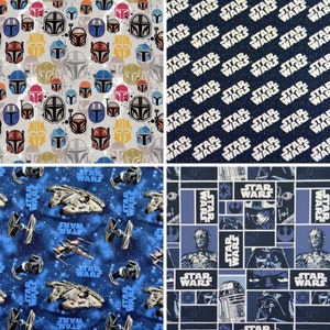 May include: Four different fabric swatches featuring Star Wars characters and imagery. The first swatch features a repeating pattern of various Star Wars helmets in shades of blue, red, yellow, and grey on a white background. The second swatch features a repeating pattern of the words "Star Wars" in white on a dark blue background with white stars. The third swatch features a repeating pattern of Star Wars spaceships in shades of grey, white, and blue on a dark blue background with white stars. The fourth swatch features a repeating pattern of Star Wars characters and imagery in shades of blue, grey, and white on a dark blue background.