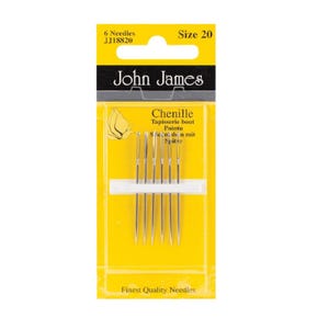 May include: A pack of six John James size 20 chenille needles on a yellow and black card. The packaging displays the text 6 Needles, JJ18820, Size 20, John James, Chenille, Tapisserie bout Pointu, Sticknadeln mit Spitze, and Finest Quality Needles.
