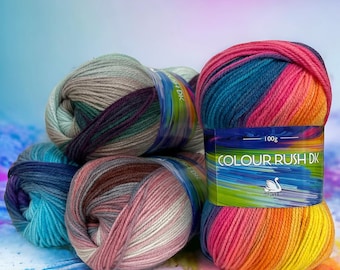 May include: A stack of colorful yarn balls in shades of pink, blue, green, and brown. The yarn is labeled "Colour Rush DK 100g".