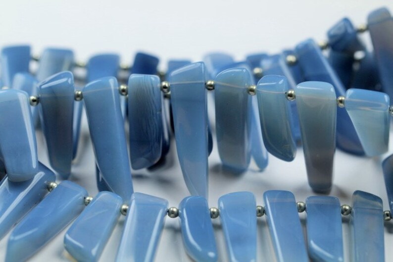 10 inch long strand smooth BLUE OPAL sticky beads 4.5 x 6.5 x 17--6 x 7 x 32 mm
