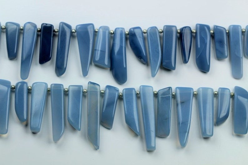 10 inch long strand smooth BLUE OPAL sticky beads 4.5 x 6.5 x 17--6 x 7 x 32 mm