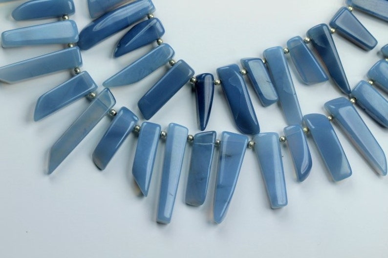 10 inch long strand smooth BLUE OPAL sticky beads 4.5 x 6.5 x 17--6 x 7 x 32 mm