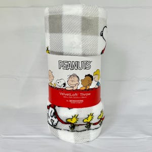 Coperta natalizia in peluche Snoopy e Woodstock dei Peanuts
