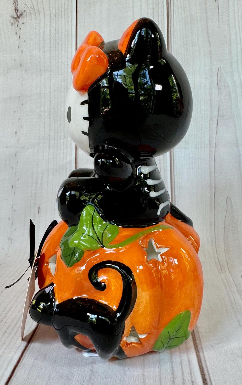 Blue Sky Clayworks Hello Kitty Skeleton Candle Holder