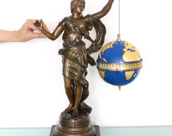 GRAVITY Clock Mantel Super Rare Clock TOURNANT Globe ROTATING French Escapement. Offered With a One Years Guarantee!!