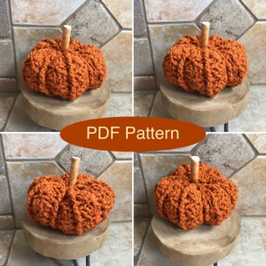 May include: Four crocheted orange pumpkins with wooden stems, each sitting on a wooden round base. The pumpkins are arranged in a grid pattern. The text "PDF Pattern" is displayed in the center of the image.