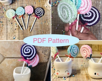 May include: Crochet lollipop pattern PDF.  The pattern includes instructions for making a variety of colorful lollipops.  The lollipops are shown in a tooth-shaped mug.