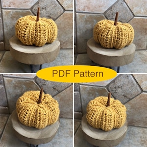 May include: Four crocheted pumpkins in a mustard yellow colour, each sitting on a wooden slice. The pumpkins are all the same size and have a similar design. The image is labelled "PDF Pattern".