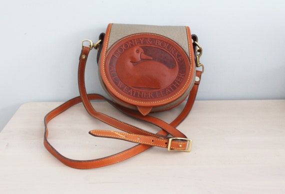 dooney and bourke duck logo