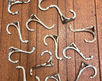 Painted dainty acorn-tip cast iron hooks, selling individually - antique hardware