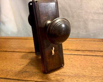 Steel Craftsman knob and plate set with some rust and damage - antique door hardware