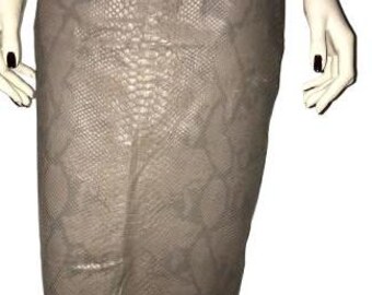 May include: A brown snakeskin-patterned skirt with a fitted silhouette.