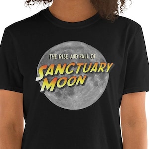 May include: Black t-shirt with a graphic of a full moon and the text "The Rise and Fall of Sanctuary Moon".