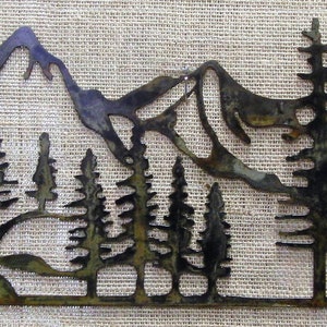 Mountain and trees scene metal wall art