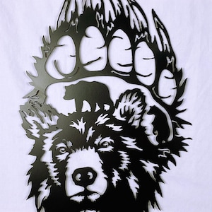 Bears in paw scene metal art