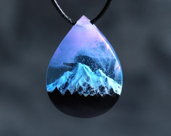 Aurora Borealis-hanger houthars: glow in dark bergketting