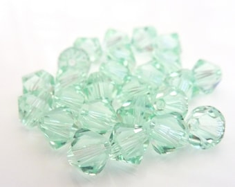 12pc Swarovski Crystal Chrysolite 5mm Bicone 5328 Bead Pastel Green