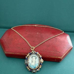 Antique gold and royal blue enamel miniature Portrait pendant brooch.