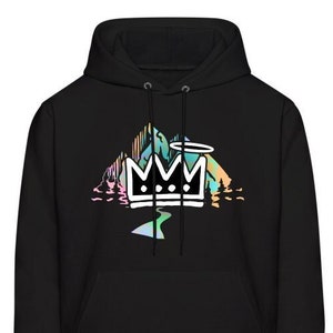 May include: Black hooded sweatshirt with a graphic print of a crown over a mountain range with a rainbow color scheme.