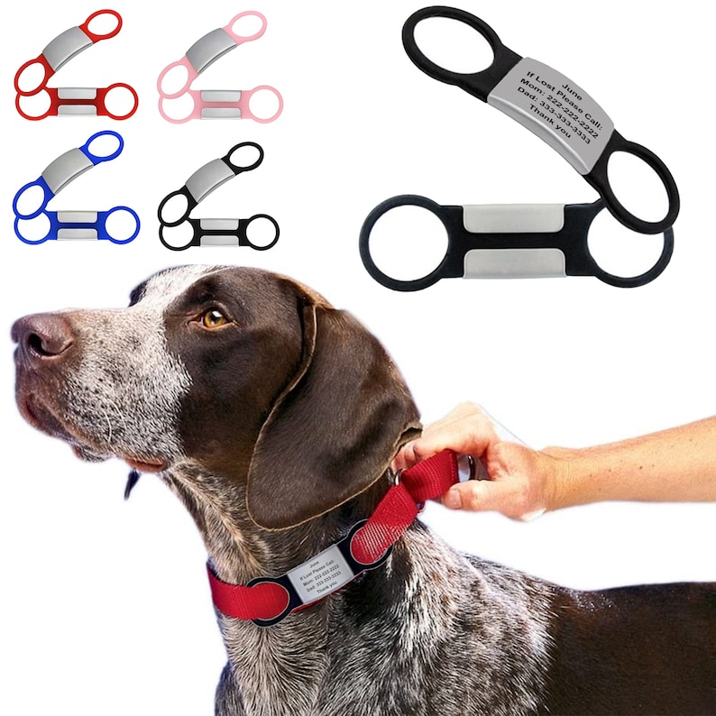 May include: A set of four dog collar tags in red, pink, blue, and black. Each tag has a silver metal plate with a space for engraving. The tags are designed to be attached to a dog's collar. The image also shows a dog wearing a red collar with a tag attached.