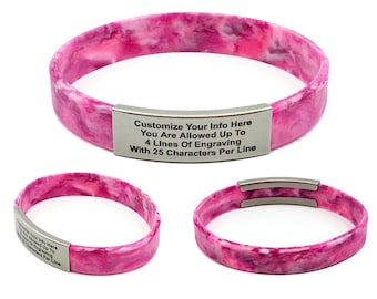 May include: A pink and white marbled silicone bracelet with a silver metal plate that reads "Customize Your Info Here You Are Allowed Up To 4 Lines Of Engraving With 25 Characters Per Line".