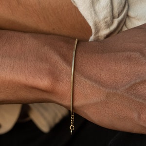 Herenarmband zilver/goud • Minimalistische armband voor heren • Slangendesign armband roestvrij staal - verjaardagscadeau voor hem