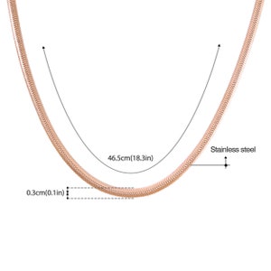 May include: A rose gold snake chain necklace made of stainless steel. The necklace is 18.3 inches long and 0.1 inches wide.
