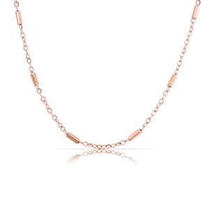May include: A rose gold chain necklace with small, cylindrical beads.