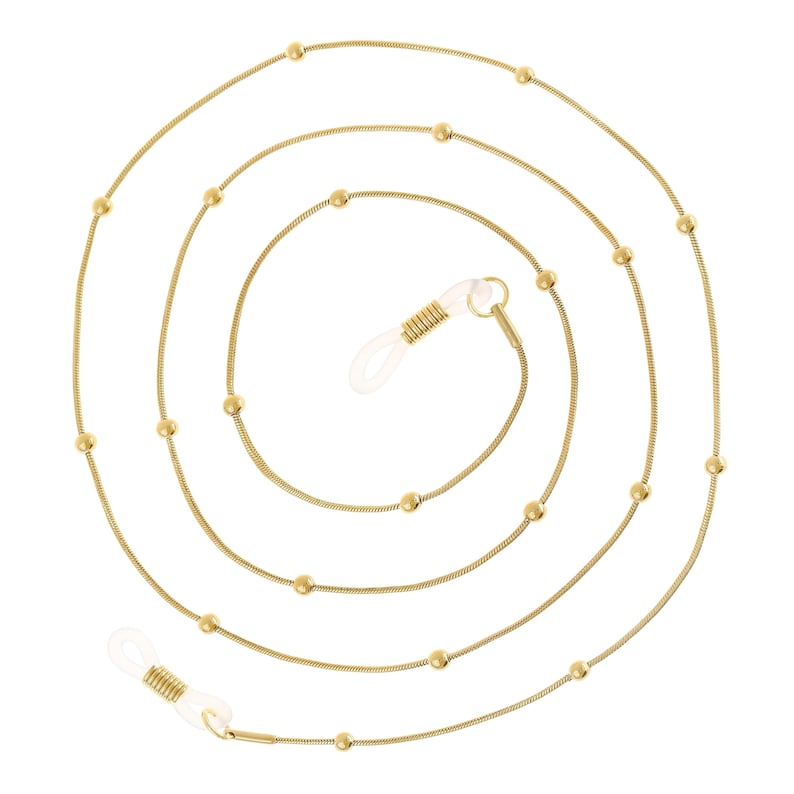 May include: A gold chain with small round beads, designed to hold glasses. The chain has two spring-loaded clasps for attaching to the temples of glasses.