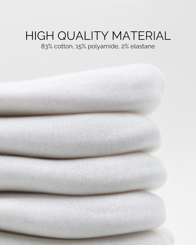 May include: Close-up of a stack of white fabric. The fabric is soft and smooth, and it is folded neatly. The text "HIGH QUALITY MATERIAL 83% cotton, 15% polyamide, 2% elastane" is visible at the top of the image.