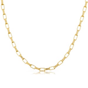 May include: A gold chain necklace with a square link design.