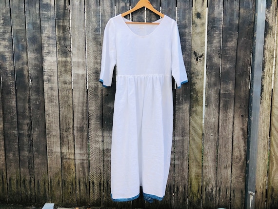 white linen flowing dress